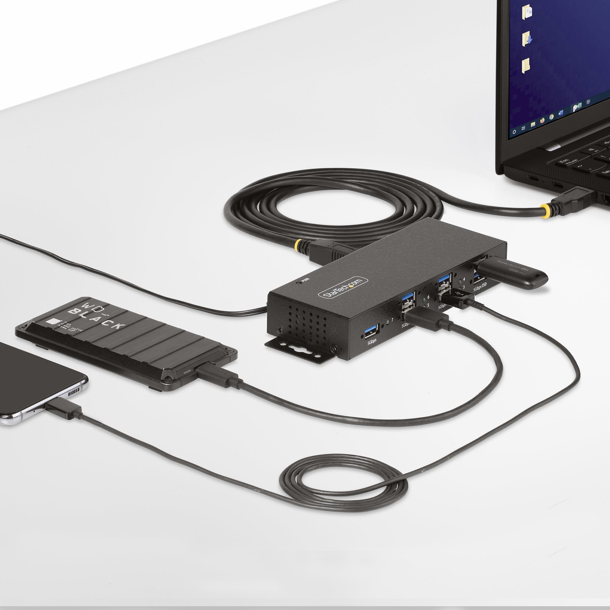 ningsskydd, monterbar på vägg/skrivbord/skena, USB 3.0/3.1/3.2 Gen 1 5 Gbps StarTech.com 5G7AINDRM-USB-A-HUB 0065030898195|0